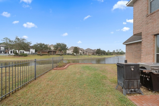 view of yard with a water view