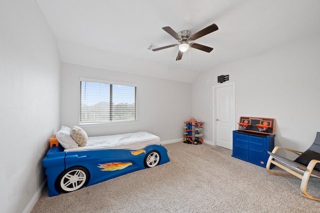 carpeted bedroom featuring vaulted ceiling and ceiling fan