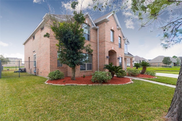 view of front of home featuring a front yard