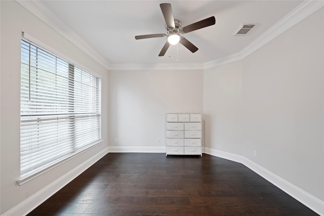 spare room featuring ornamental molding, dark hardwood / wood-style floors, and ceiling fan