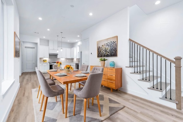 dining room featuring light wood-type flooring