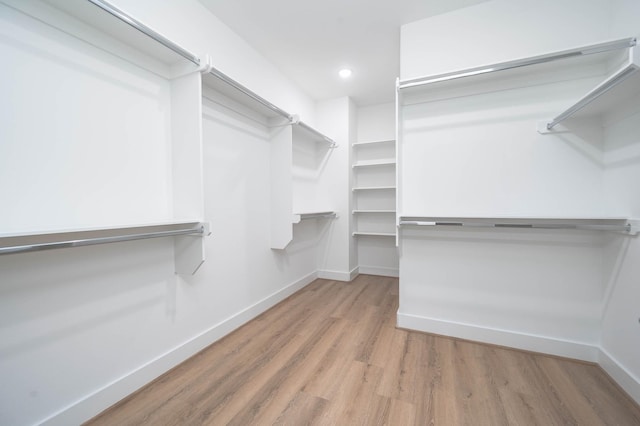 walk in closet featuring light wood-type flooring