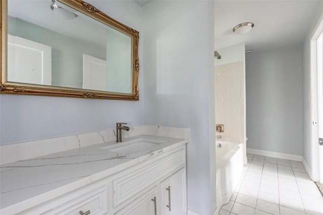 bathroom with tile patterned flooring, bathing tub / shower combination, and vanity