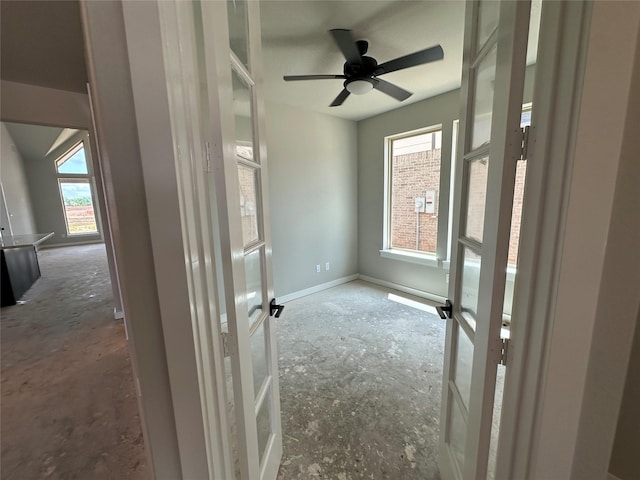 interior space with a ceiling fan