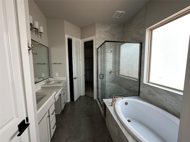 bathroom with a shower stall, double vanity, a bath, a sink, and visible vents