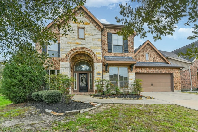 view of front of property with a garage