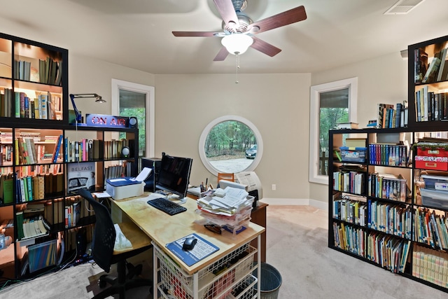 office featuring light colored carpet and ceiling fan