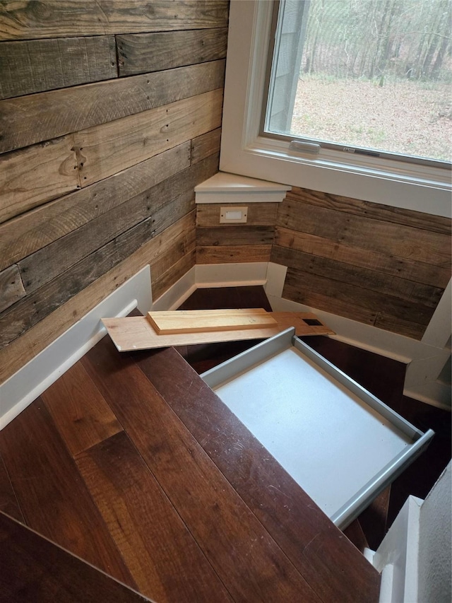 interior details featuring wood walls