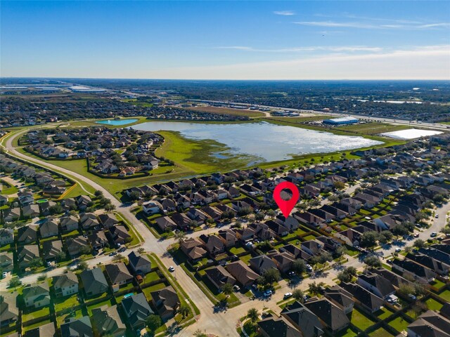 aerial view featuring a water view and a residential view