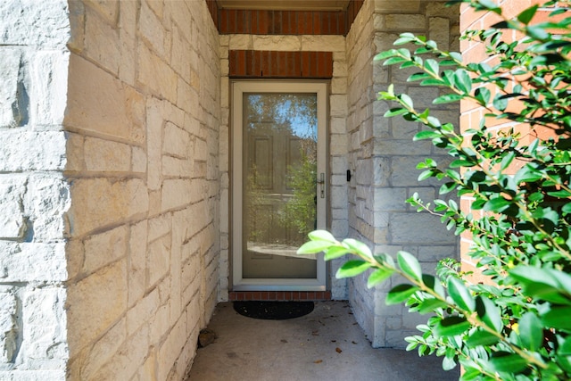 14202 Merganser Dr, Houston, TX 77047 - view of exterior entry featuring stone siding