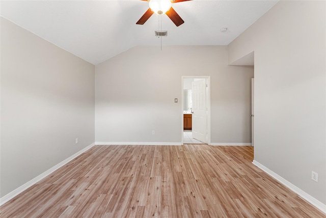 unfurnished room featuring lofted ceiling, ceiling fan, and light hardwood / wood-style flooring