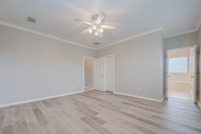 empty room featuring ceiling fan, light hardwood / wood-style floors, and ornamental molding