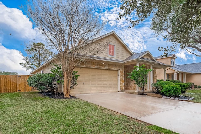 view of front of house with a front lawn and a garage