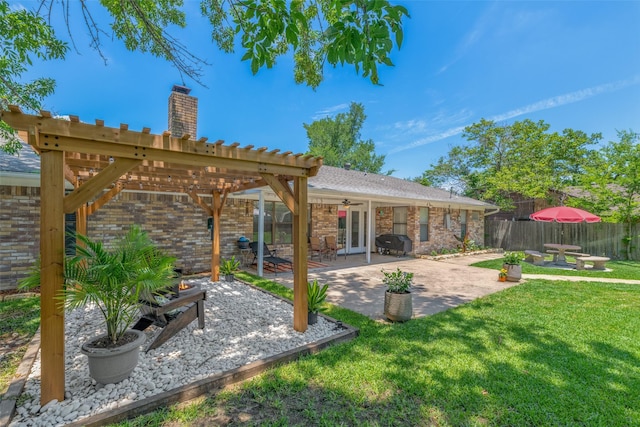 exterior space featuring french doors, grilling area, and a pergola