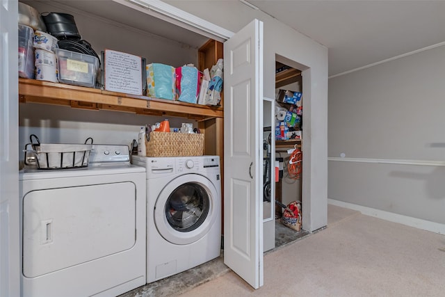 washroom with independent washer and dryer