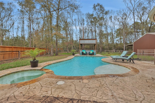 view of pool featuring an in ground hot tub and a patio