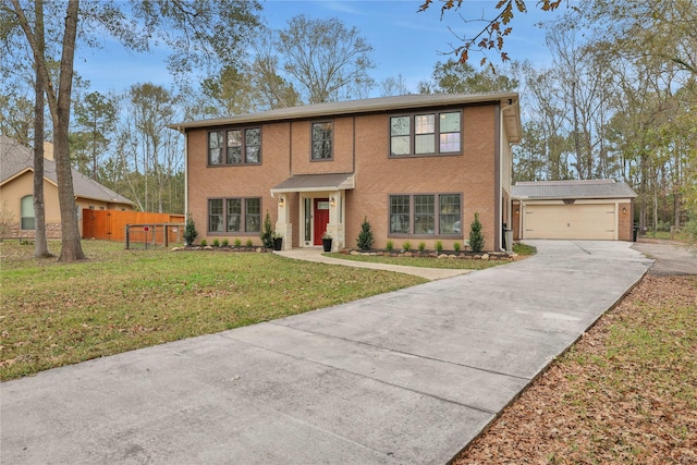 view of front of home featuring a garage and a front lawn