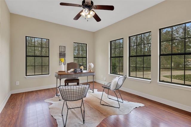 office area featuring wood-type flooring and ceiling fan