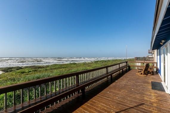 exterior space with a beach view and a water view