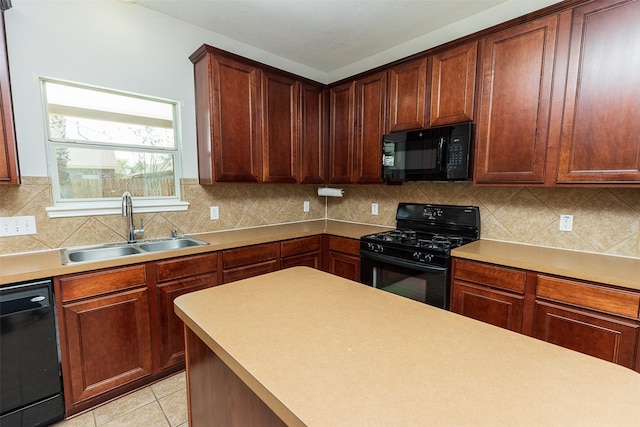 kitchen with tasteful backsplash, sink, and black appliances