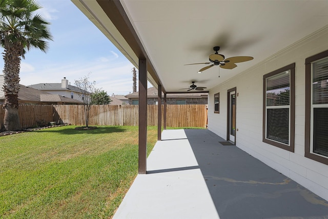 exterior space featuring ceiling fan