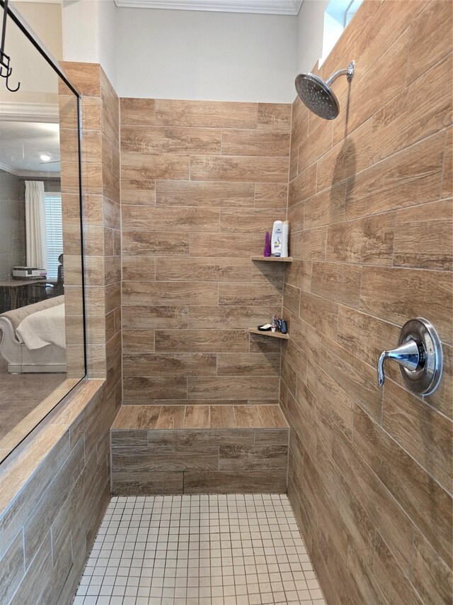 bathroom with tiled shower