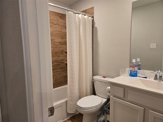 full bathroom featuring shower / bath combination with curtain, vanity, and toilet