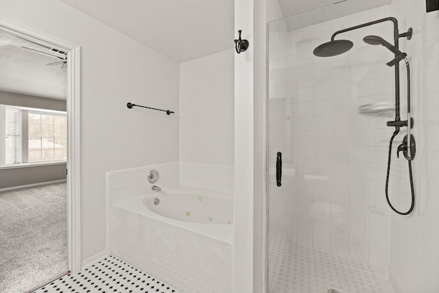 bathroom with shower with separate bathtub