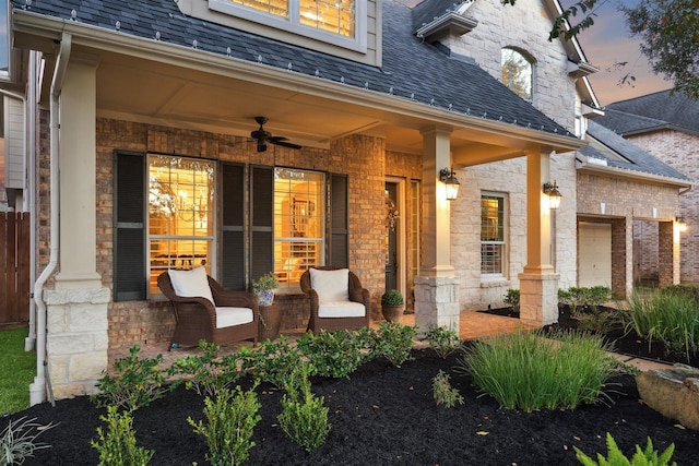 exterior space featuring a porch and ceiling fan