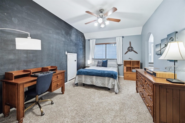 carpeted bedroom with lofted ceiling and ceiling fan