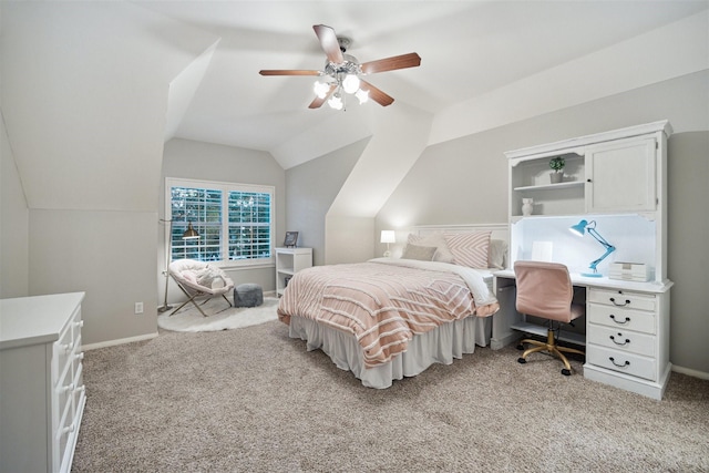 carpeted bedroom featuring lofted ceiling and ceiling fan