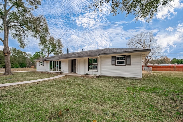 ranch-style house with a front yard