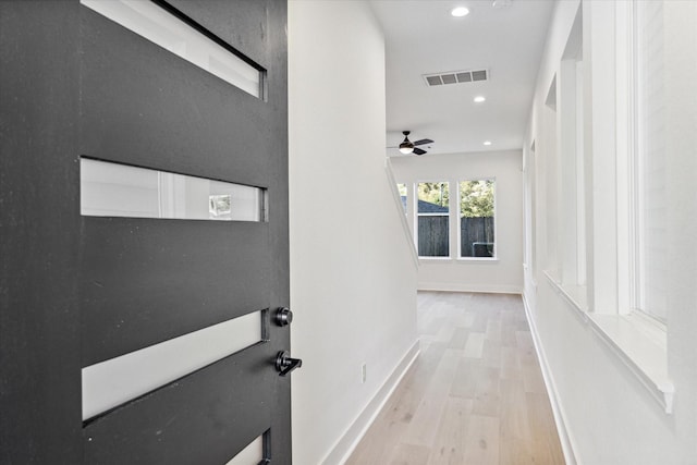 hall featuring light wood-type flooring