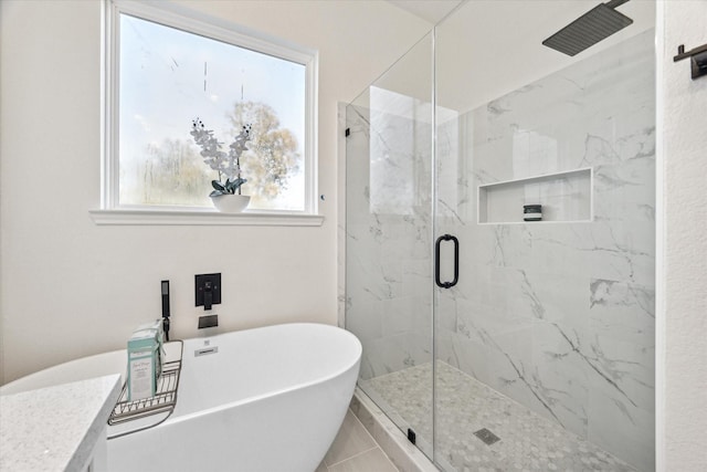 bathroom featuring tile patterned floors and plus walk in shower