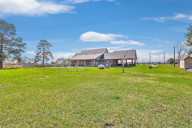 view of yard featuring fence