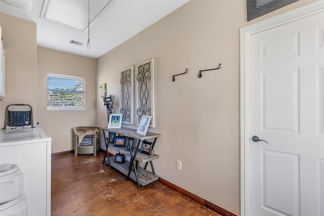 washroom with laundry area, visible vents, baseboards, washer / clothes dryer, and attic access