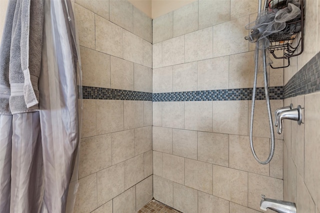 full bath featuring a stall shower