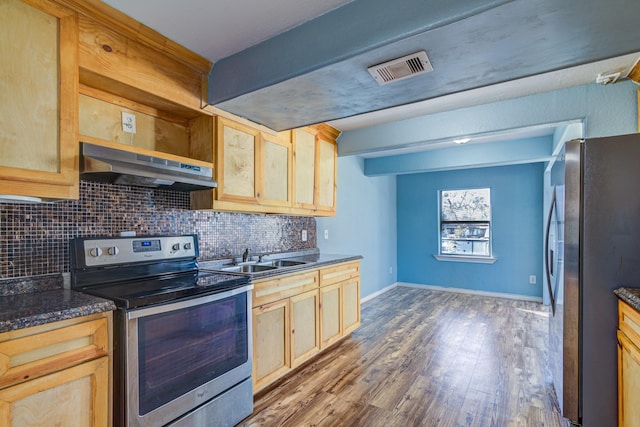 kitchen with sink, light brown cabinets, decorative backsplash, dark hardwood / wood-style flooring, and appliances with stainless steel finishes