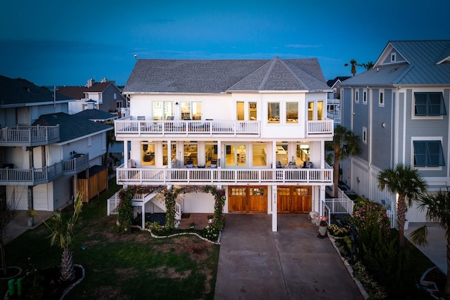 rear view of house with a balcony