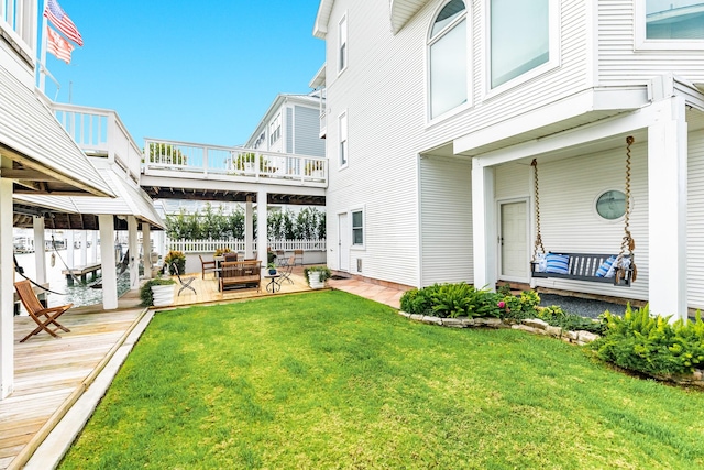 view of yard with a dock and a patio