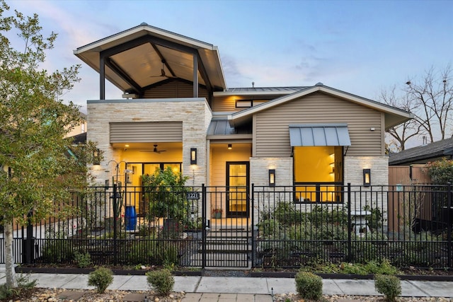 contemporary house featuring ceiling fan