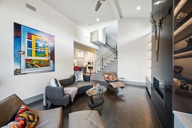 living room featuring high vaulted ceiling, ceiling fan, and dark hardwood / wood-style flooring