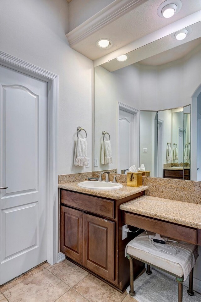 9051 Forest Cliff Ct, Conroe, TX 77302 - bathroom featuring vanity and tile patterned floors