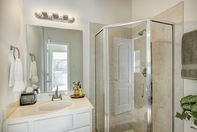 9051 Forest Cliff Ct, Conroe, TX 77302 - bathroom with a shower stall and vanity