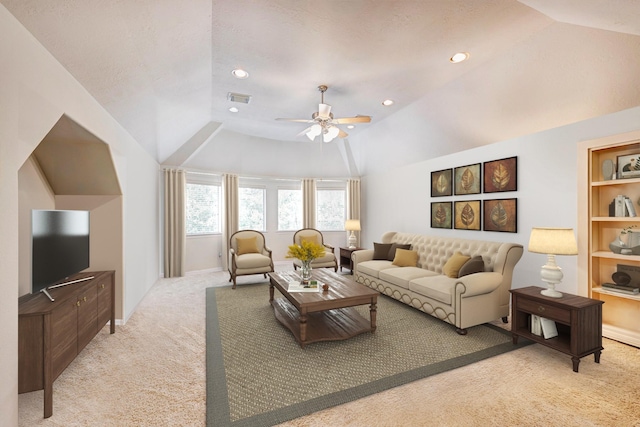 9051 Forest Cliff Ct, Conroe, TX 77302 - living room featuring light carpet, a ceiling fan, lofted ceiling, and recessed lighting