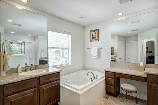 9051 Forest Cliff Ct, Conroe, TX 77302 - bathroom with a stall shower, a whirlpool tub, vanity, recessed lighting, and tile patterned flooring
