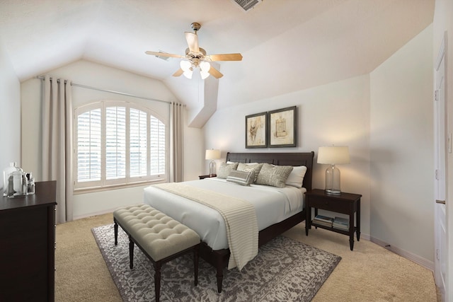 carpeted bedroom with lofted ceiling and ceiling fan