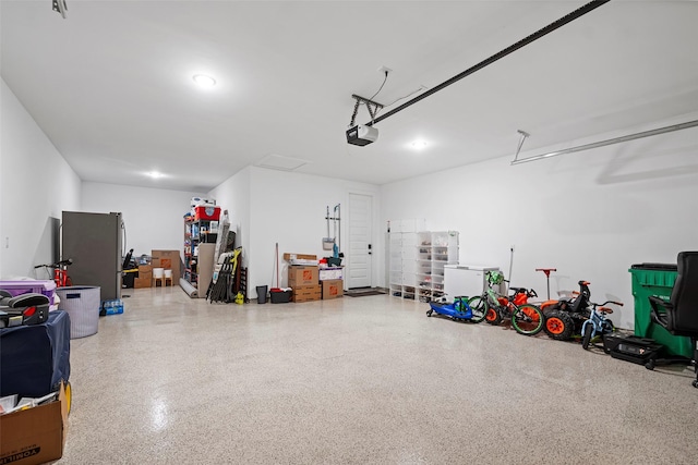 garage featuring a garage door opener