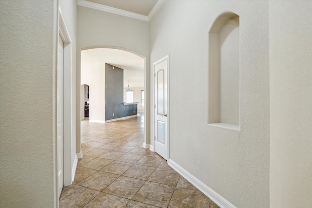 corridor featuring crown molding