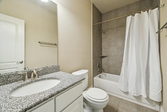 full bathroom featuring toilet, tile patterned flooring, shower / bathtub combination with curtain, and vanity